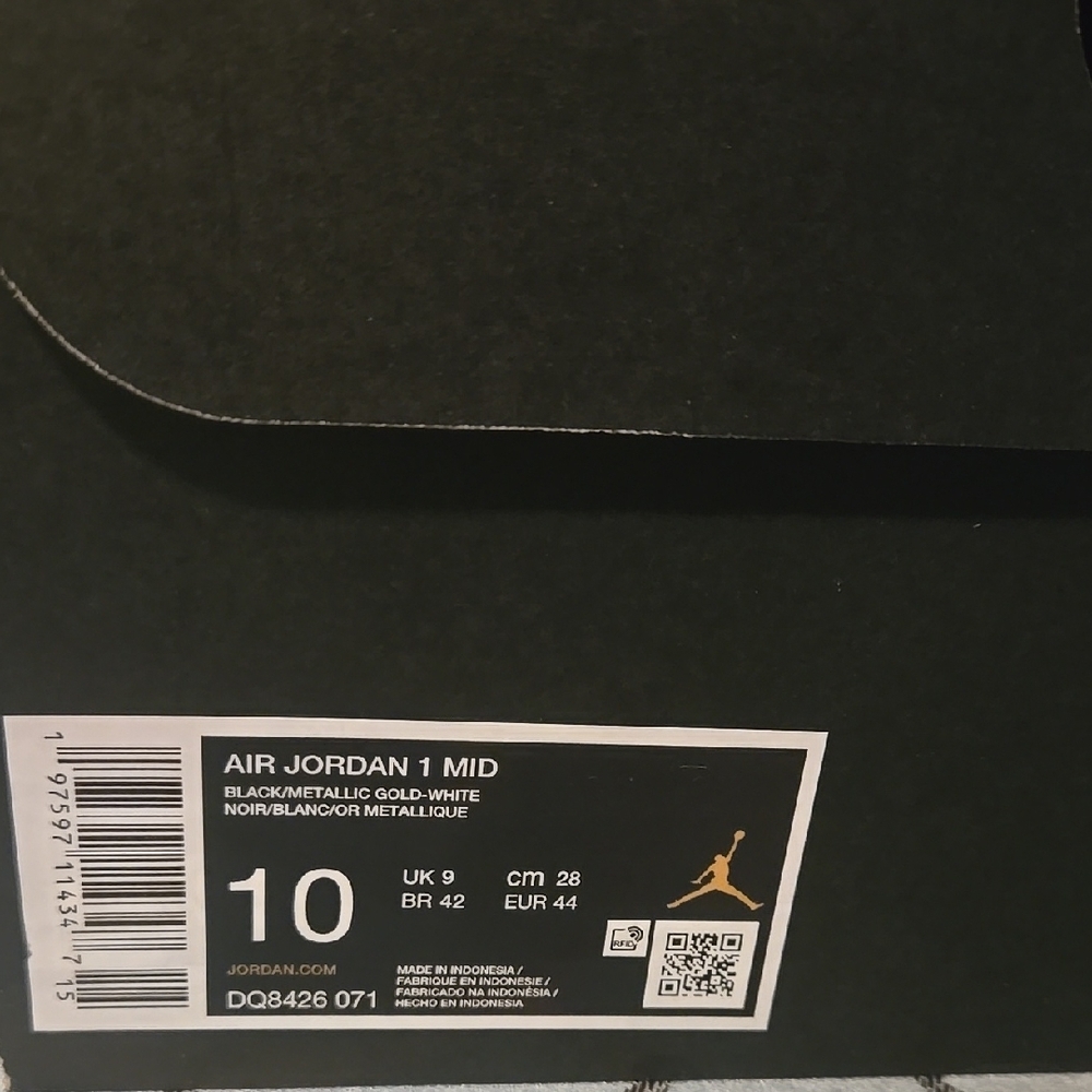 Air Jordan 1 Mid Black and Metallic Gold Sneakers